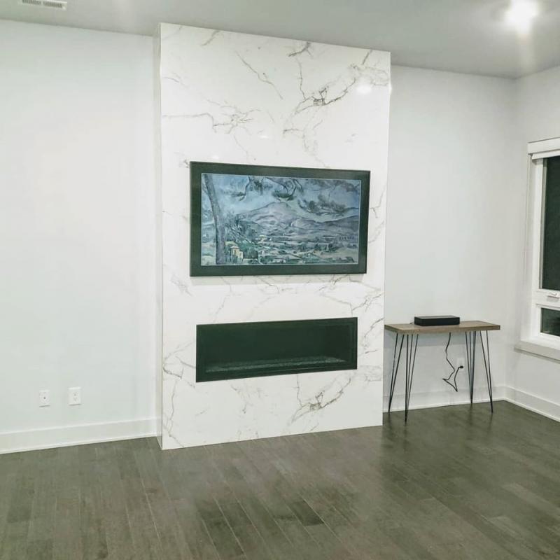 Large-Format-Marble-Look-Porcelain-Tile-Wrapped-Around-The-Fireplace